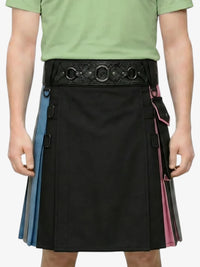 Person wearing a black kilt with colorful accents and a green shirt on a white background