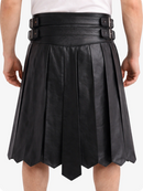 Black pleated leather skirt with belt on a white background