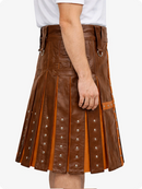 Brown leather kilt with metal studs on a white background