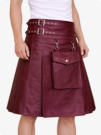 Burgundy leather skirt with silver buckles and hardware on a white background