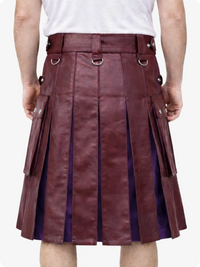 Burgundy leather kilt worn by a person on a white background