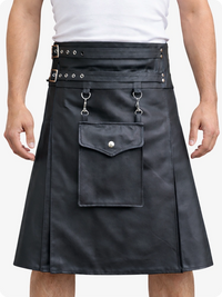 Black kilt with silver hardware worn by a person on a white background