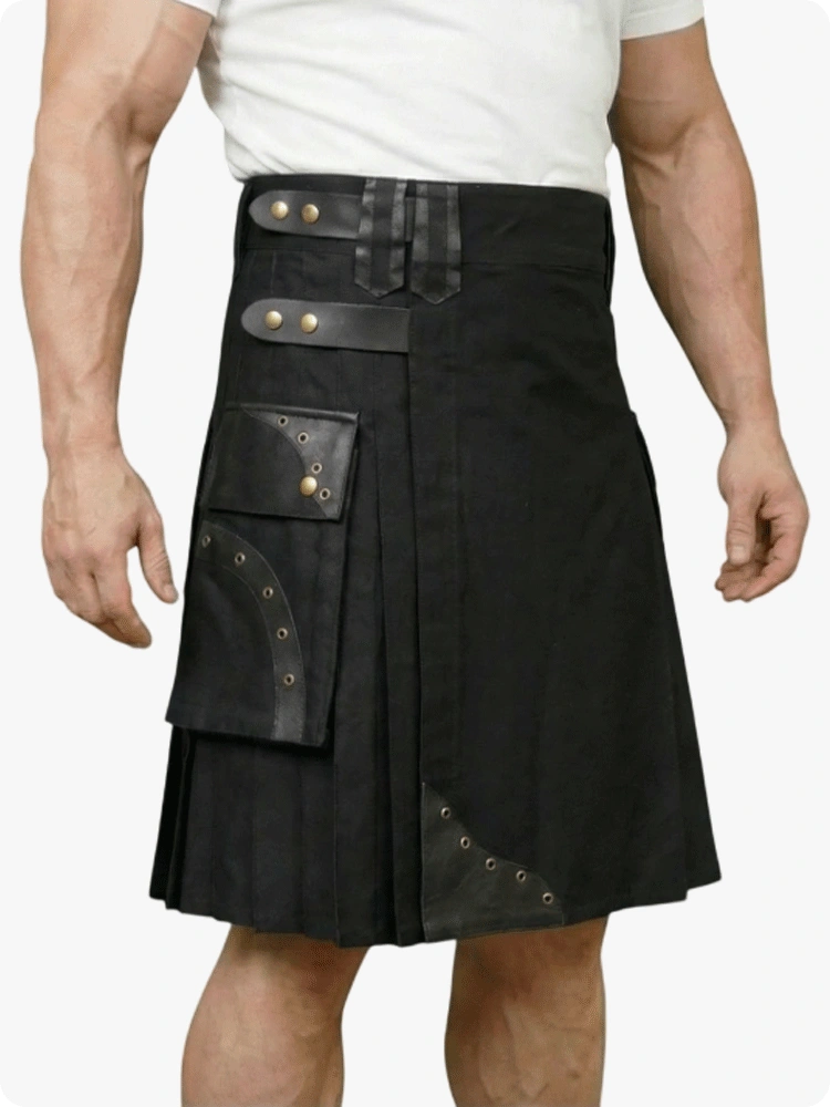 Black kilt with leather accents worn by a person on a white background