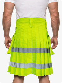 Person wearing a bright green kilt with reflective stripes on a white background