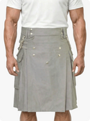 Gray kilt worn by a person on a white background