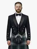 Man wearing a formal black prince charlie jacket with a dress gordon tartan plaid kilt on a white background