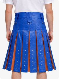 Electric Blue pleated skirt with brown accents worn by a person on a white background