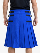 Electric Blue pleated skirt with black straps worn by a person on a white background