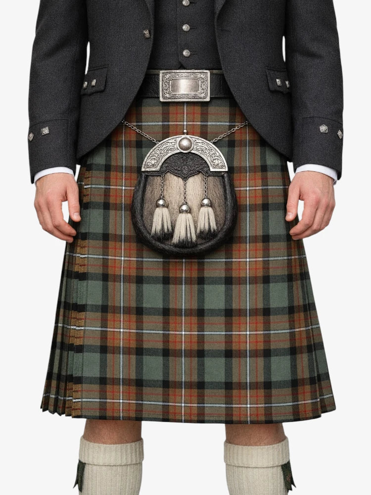 Person wearing a traditional Scottish kilt with a sporran on a white background