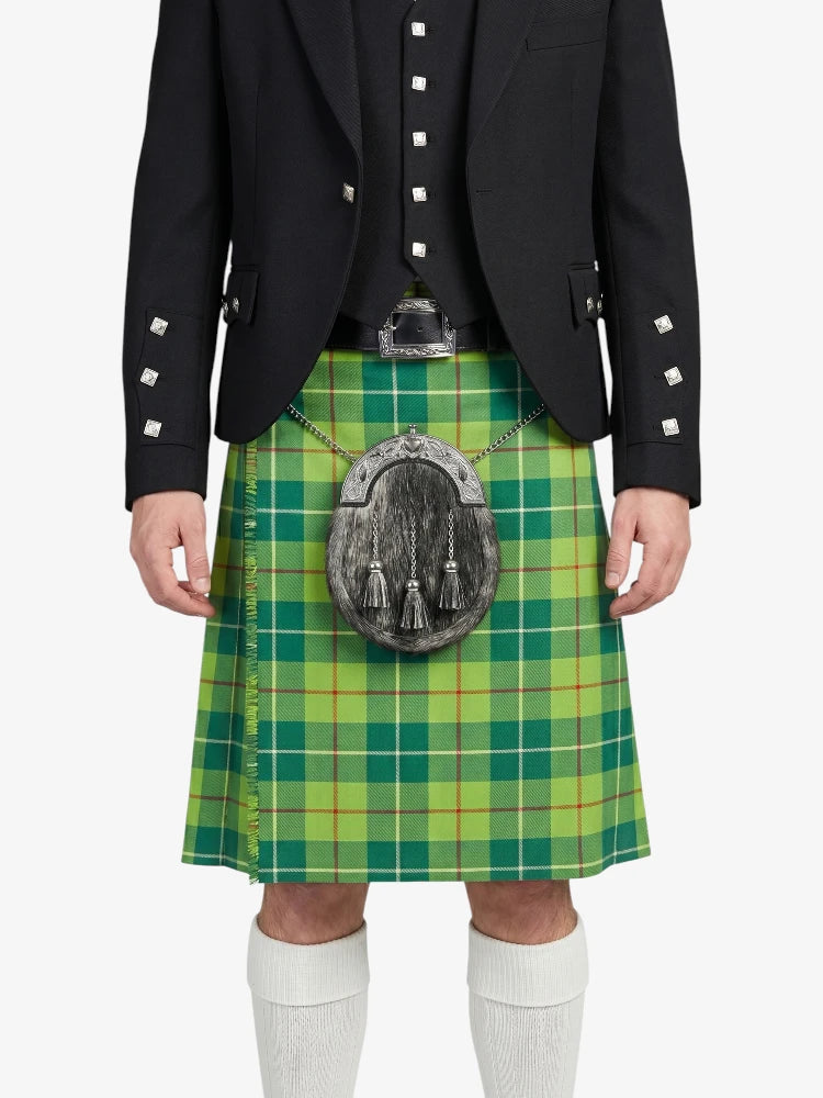 Person wearing a green plaid kilt with a black jacket on a white background
