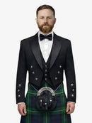 Man wearing a black prince charlie jacket with a gordon tartan kilt on a white background