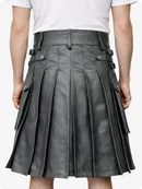 Gray pleated skirt worn by a person on a white background