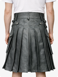 Gray pleated skirt worn by a person on a white background
