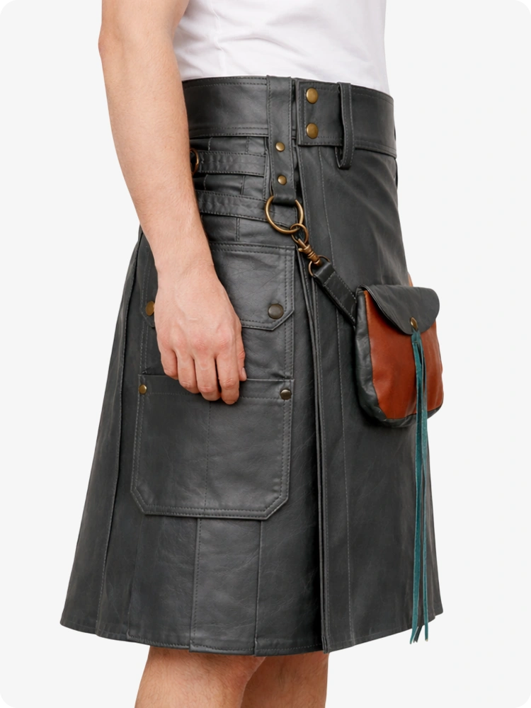 Person wearing a black leather kilt with brown leather pouches on a white background