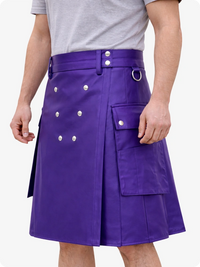 Person wearing a purple kilt with white buttons on a plain background