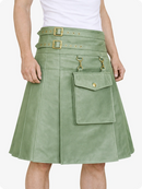 Green skirt with gold accents worn by a person on a white background