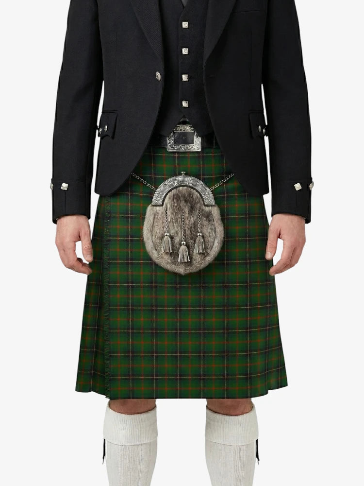 Person wearing a traditional Scottish kilt with a tartan pattern on a white background