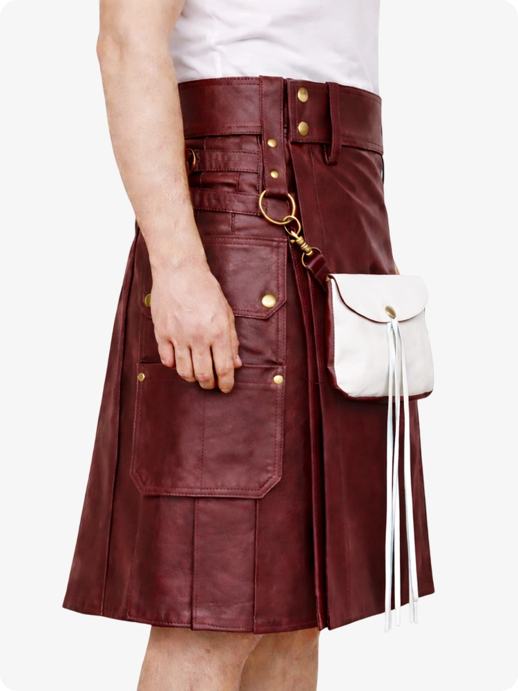 Maroon leather kilt with gold buttons and a white bag on a white background