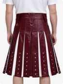 Maroon leather skirt with white accents worn by a person on a white background