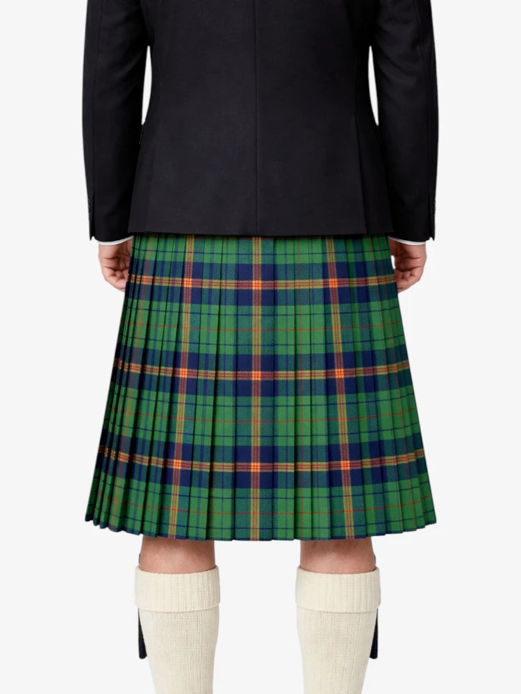 Person wearing a black jacket and green plaid kilt on a white background