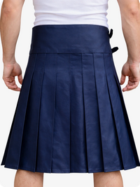 Navy Blue pleated skirt worn by a person on a white background