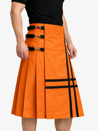 Orange skirt with black accents worn by a person on a white background