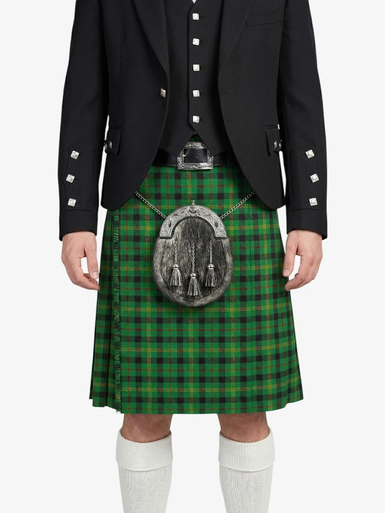 Person wearing a green plaid kilt with a black jacket on a white background