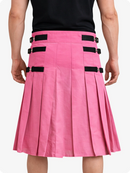 Pink pleated skirt with black accents worn by a person on a white background