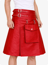 Red leather skirt with silver buckles and hardware on a white background