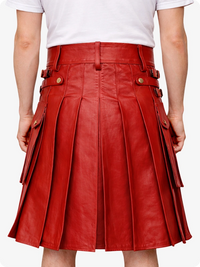 Red leather skirt worn by a person on a white background