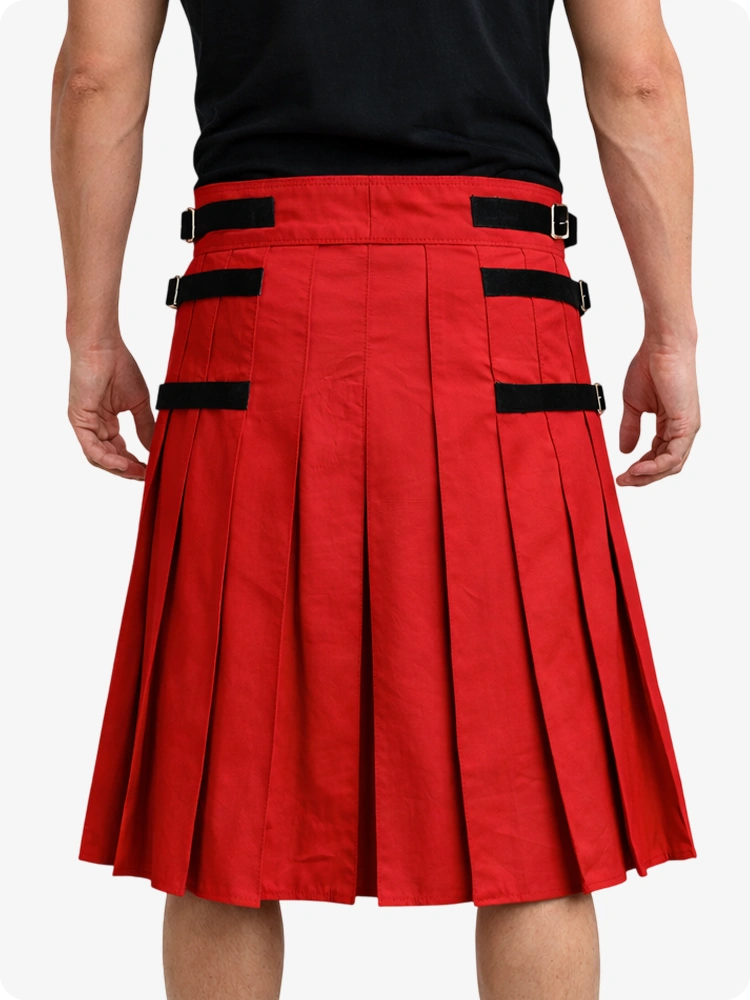 Red pleated skirt with black straps on a white background