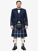 Man wearing a traditional Scottish kilt with a navy jacket and white socks on a white background