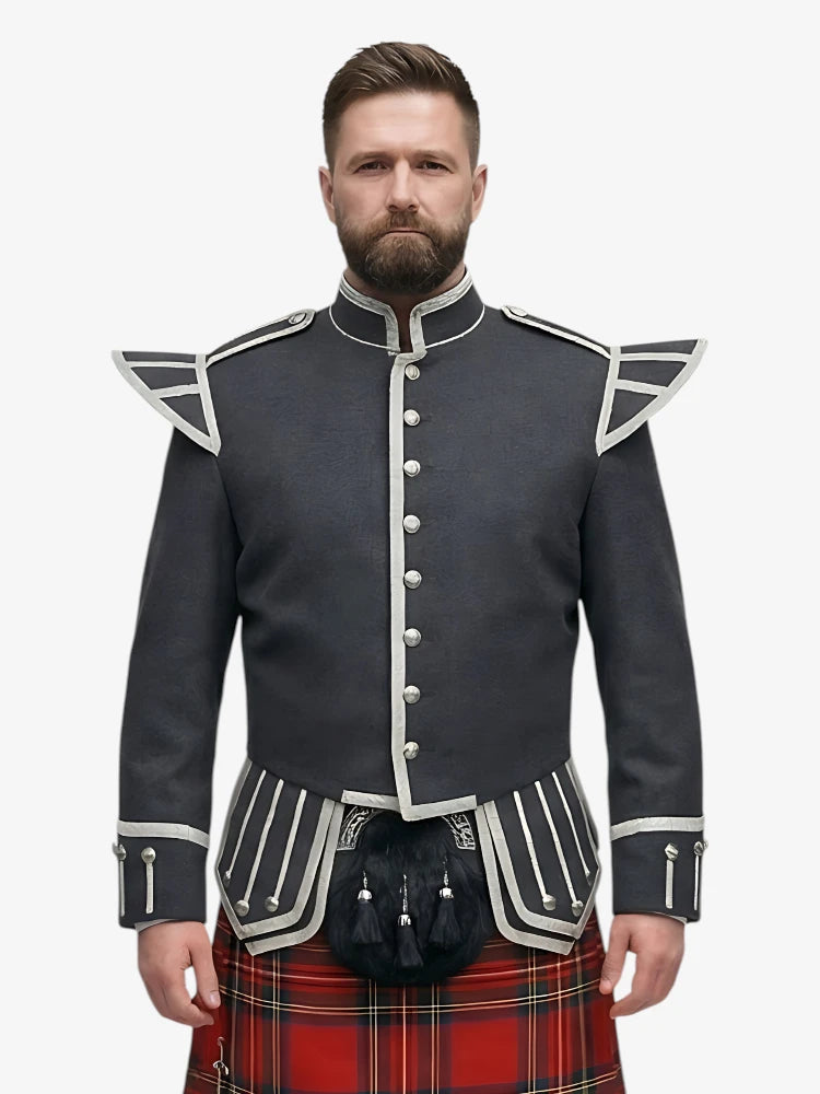 Man wearing a dark grey jacket with white trim and a royal stewart tartan kilt on a white background