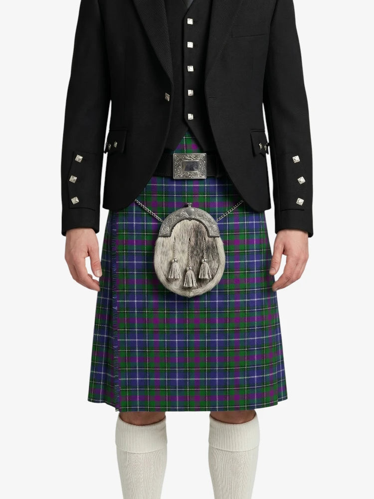 Person wearing a traditional Scottish kilt with a tartan pattern on a white background