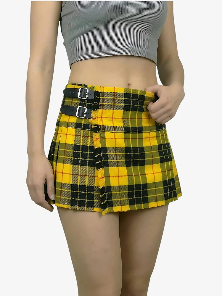 Person wearing a yellow and black plaid skirt on a white background