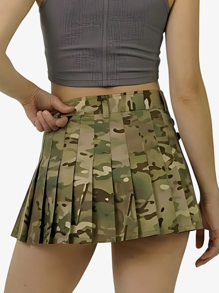 Camouflage pleated skirt worn by a person on a white background